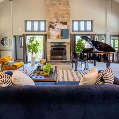 a large room with a piano